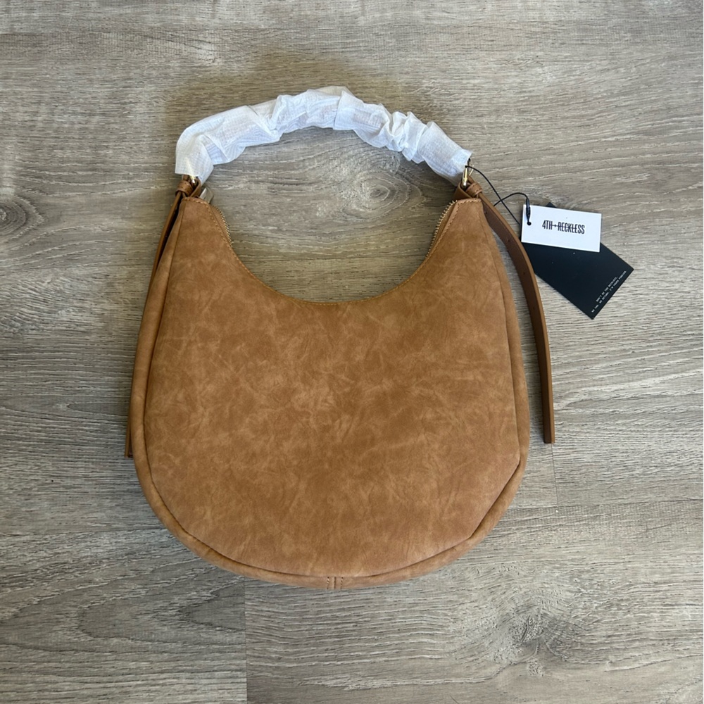 Fourth Studio faux suede crescent bag.